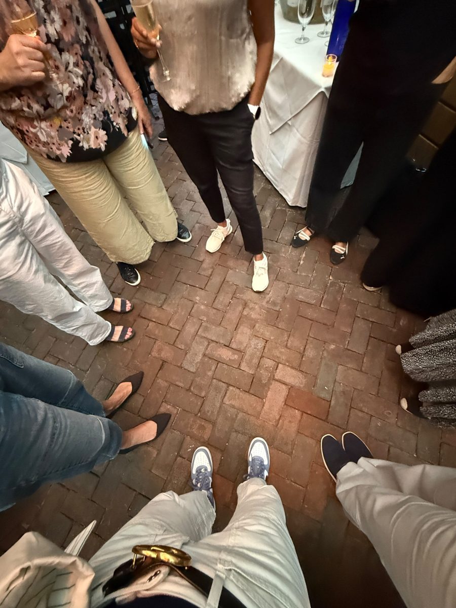 Members of a Meridian Circle standing together in a circle